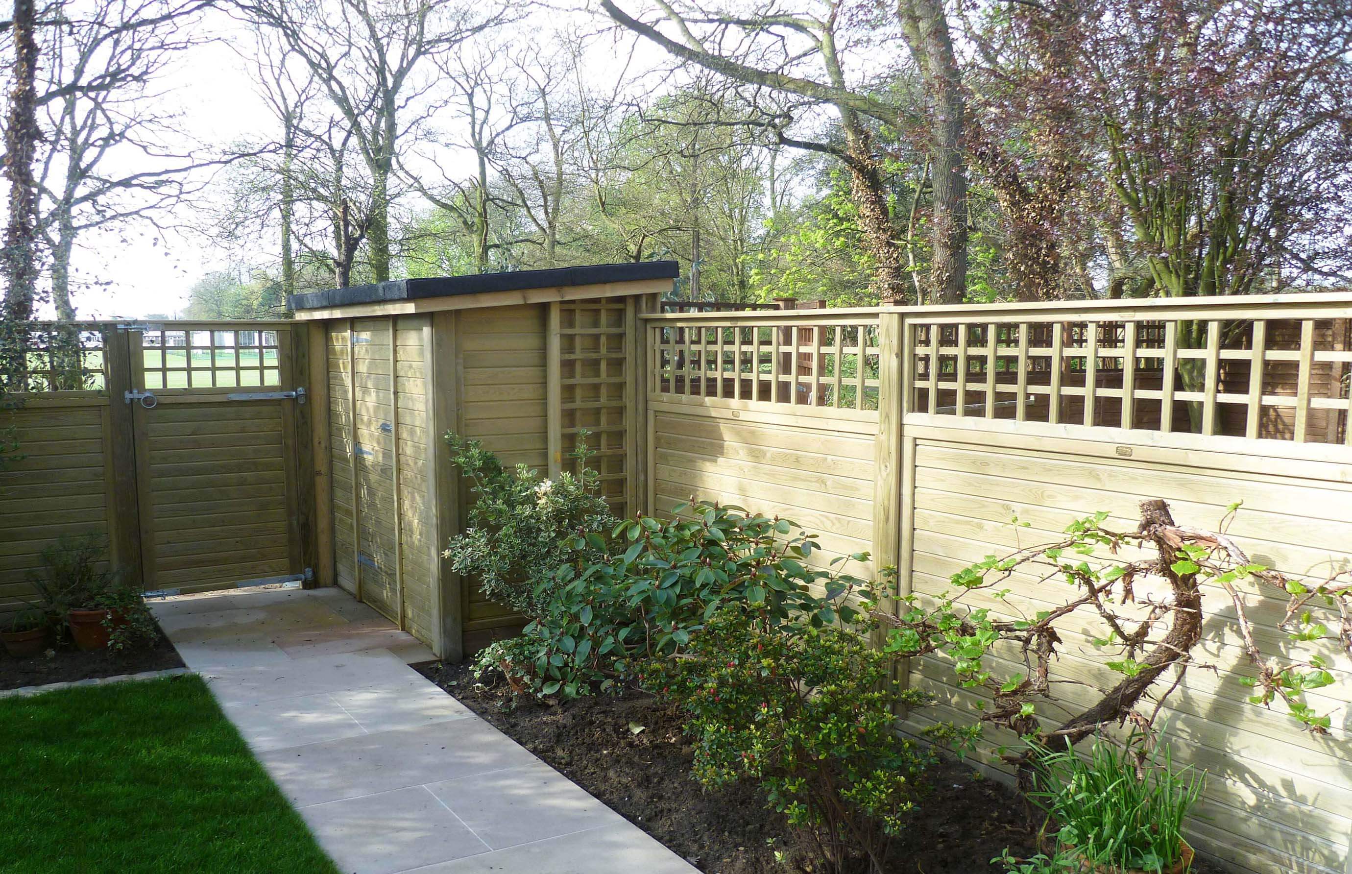 Fence with trellis gate and shed matching