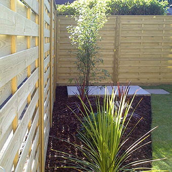 sunlight through the horizontal fence panels