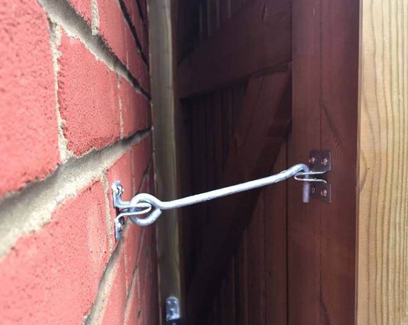 Cabin Hook Holding Garden Gate