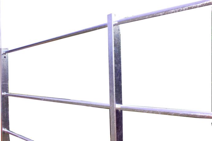 Tubular form estate railings with galvanised finish