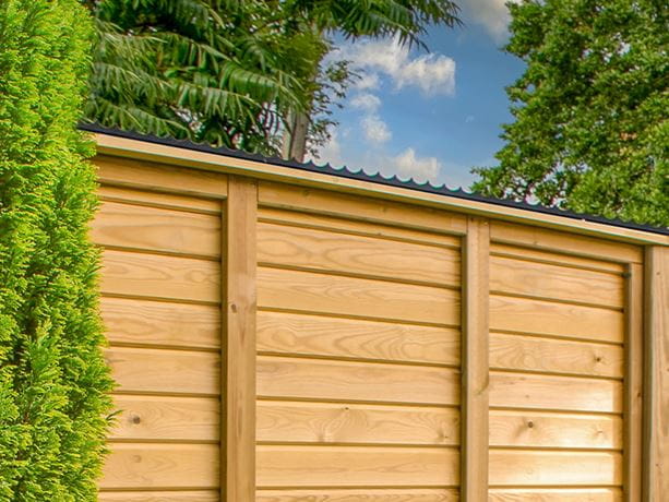 powder coated security comb on timber fence