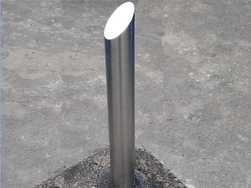 Sloped top stainless steel bollard