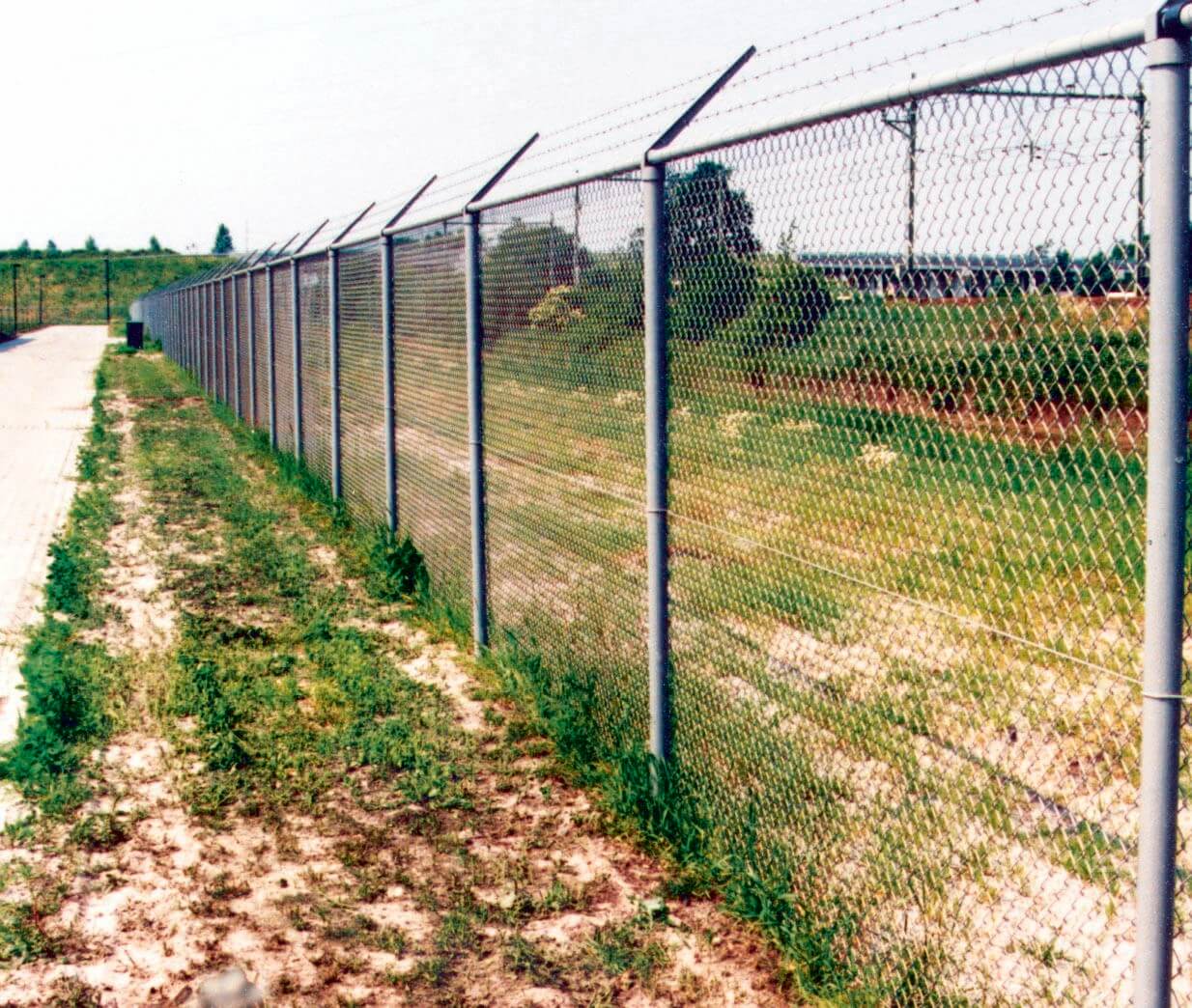 Chain Link Fencing with Cranked Extensions