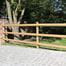 Post and rail fencing in garden