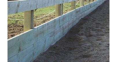 Timber riding arena board