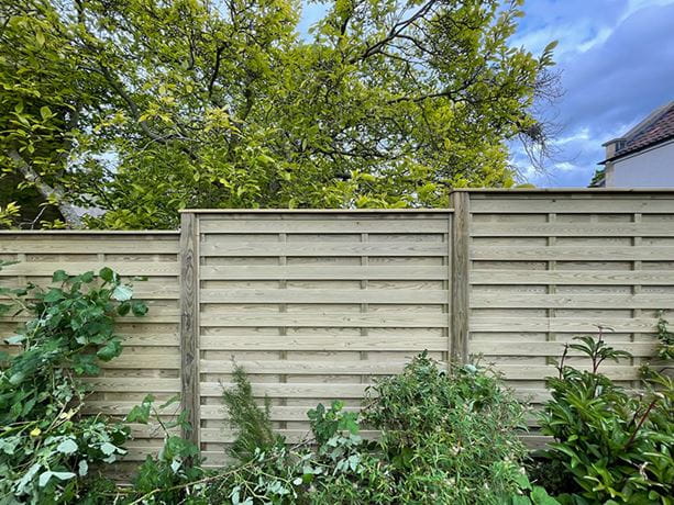 Slatted fencing with privacy