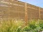 Venetian fencing situated in a garden