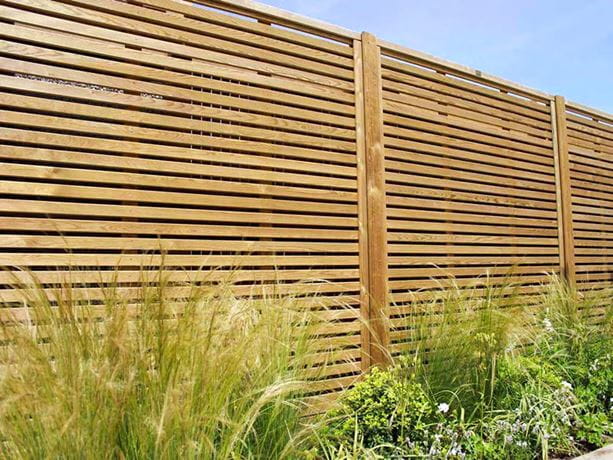 Venetian fencing situated in a garden