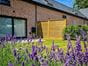 Venetian fence panels as garden screens