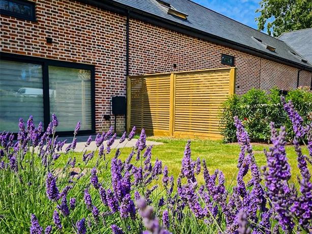 Venetian fence panels as garden screens