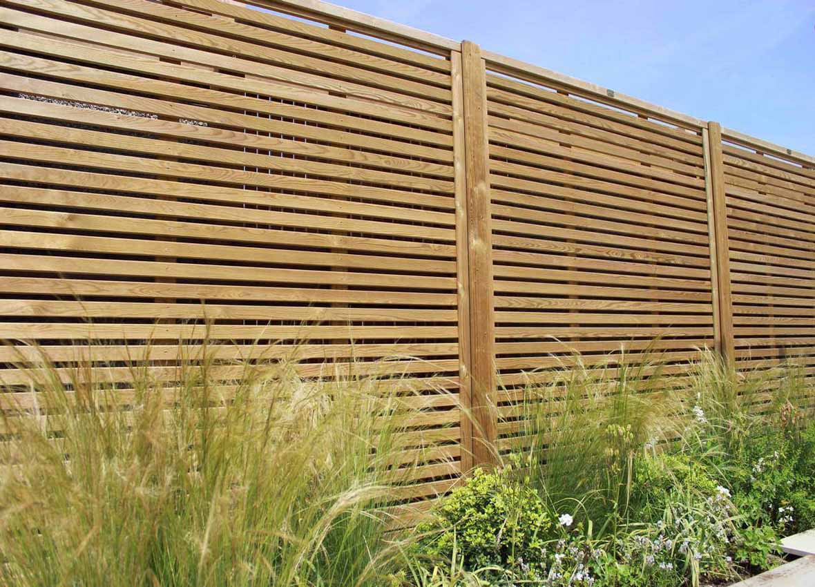Venetian fencing situated in a garden
