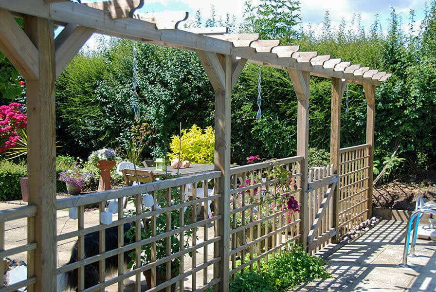 Featherboard with square trellis toppers family garden
