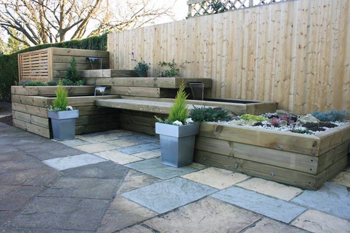 garden with oil tank hideaway