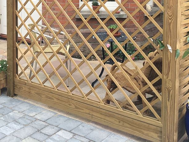 Gravel board used under diamond trellis