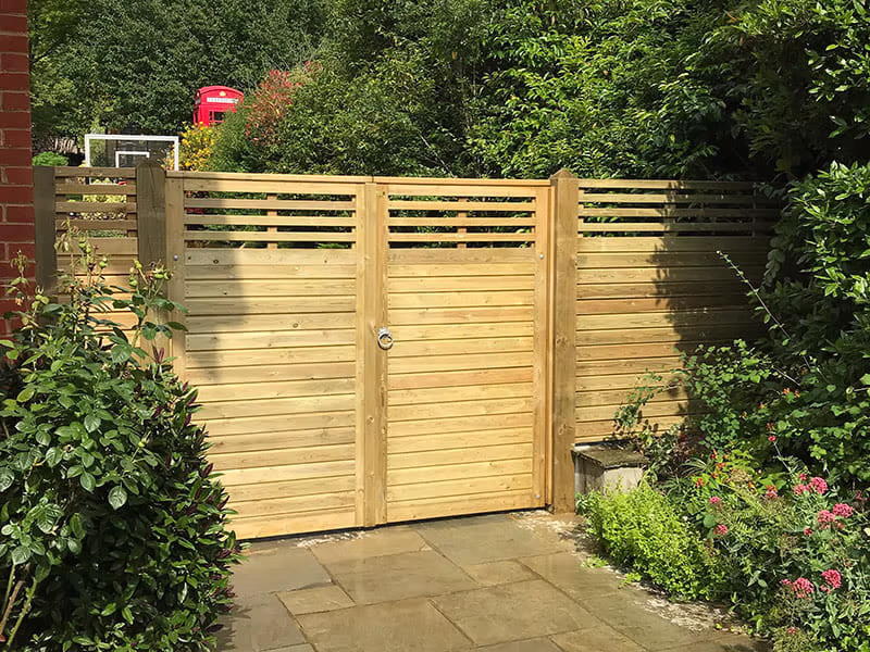 Wooden gate with slatted top