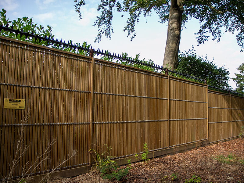 Security fencing with topping