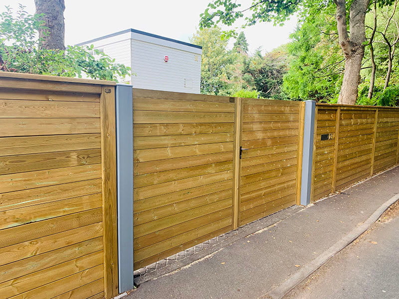 Acoustic fencing on driveway