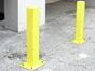 Metal bollards on concrete