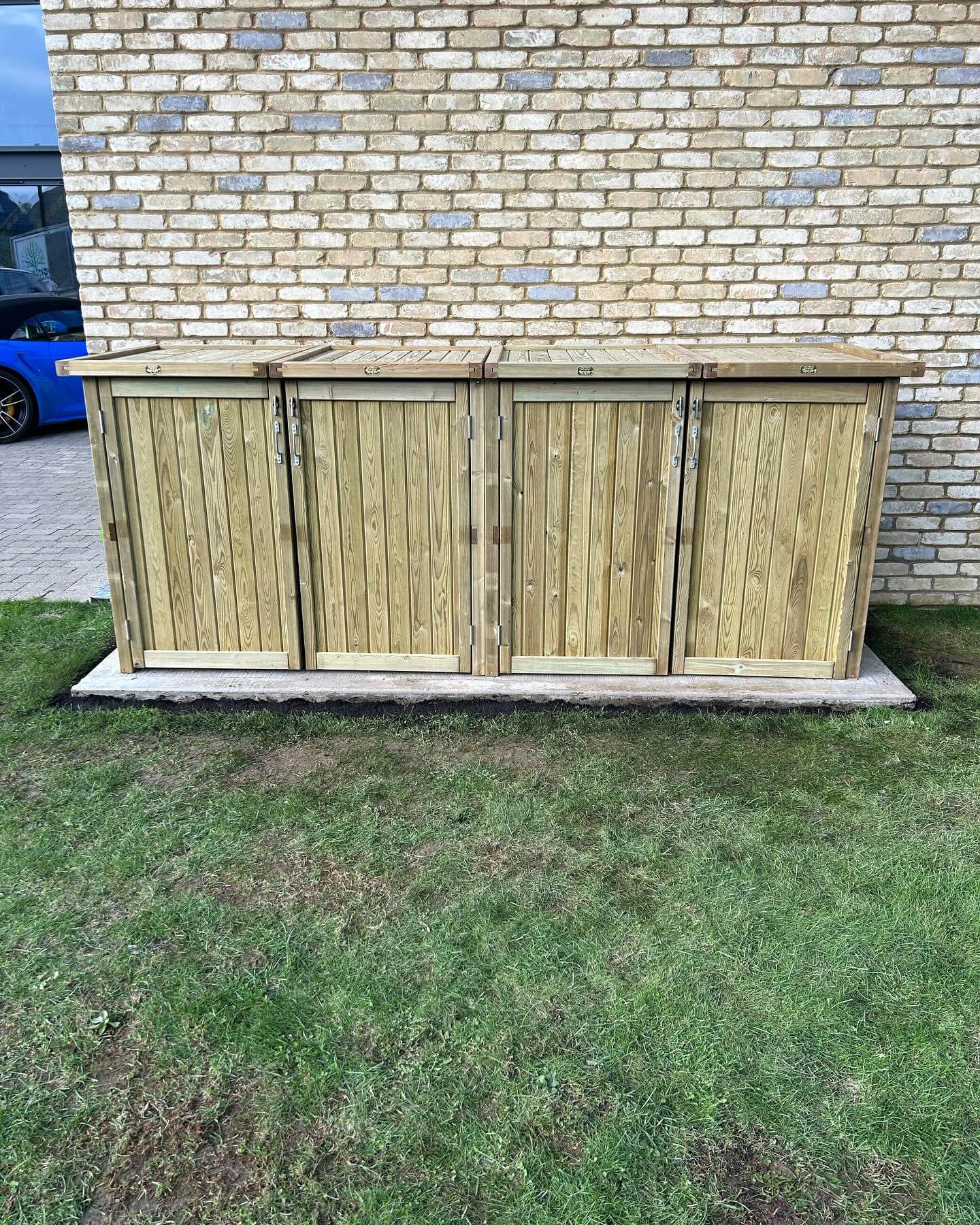 Double Wooden Wheelie Bin Store on Concrete Base