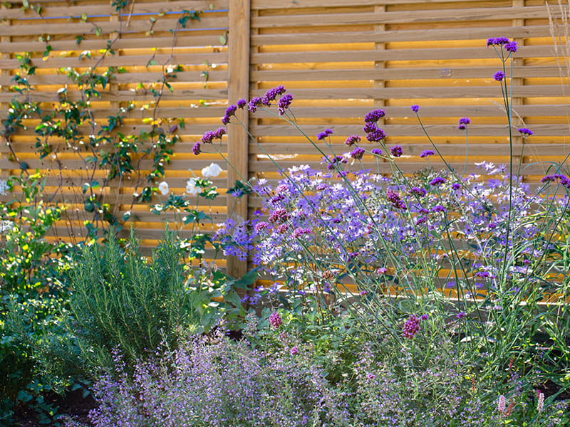 Semi solid slatted fence panels