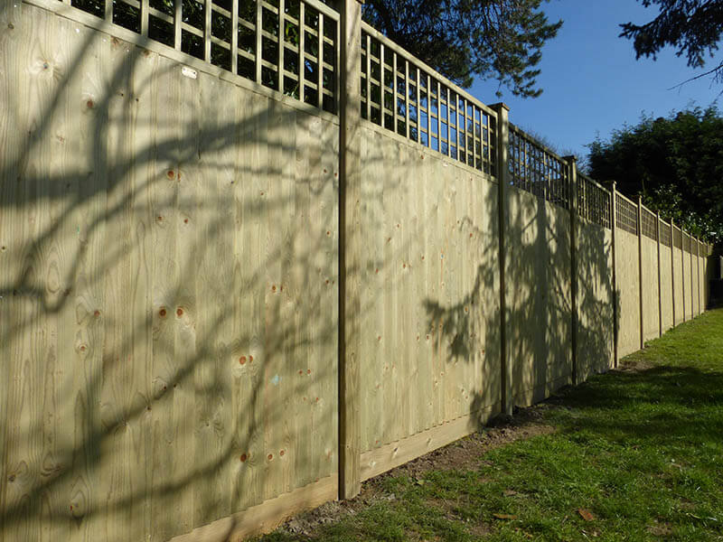 trellis panel on top of fence