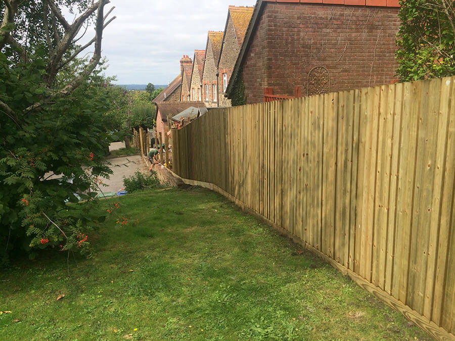 Traditional featherboard garden fence