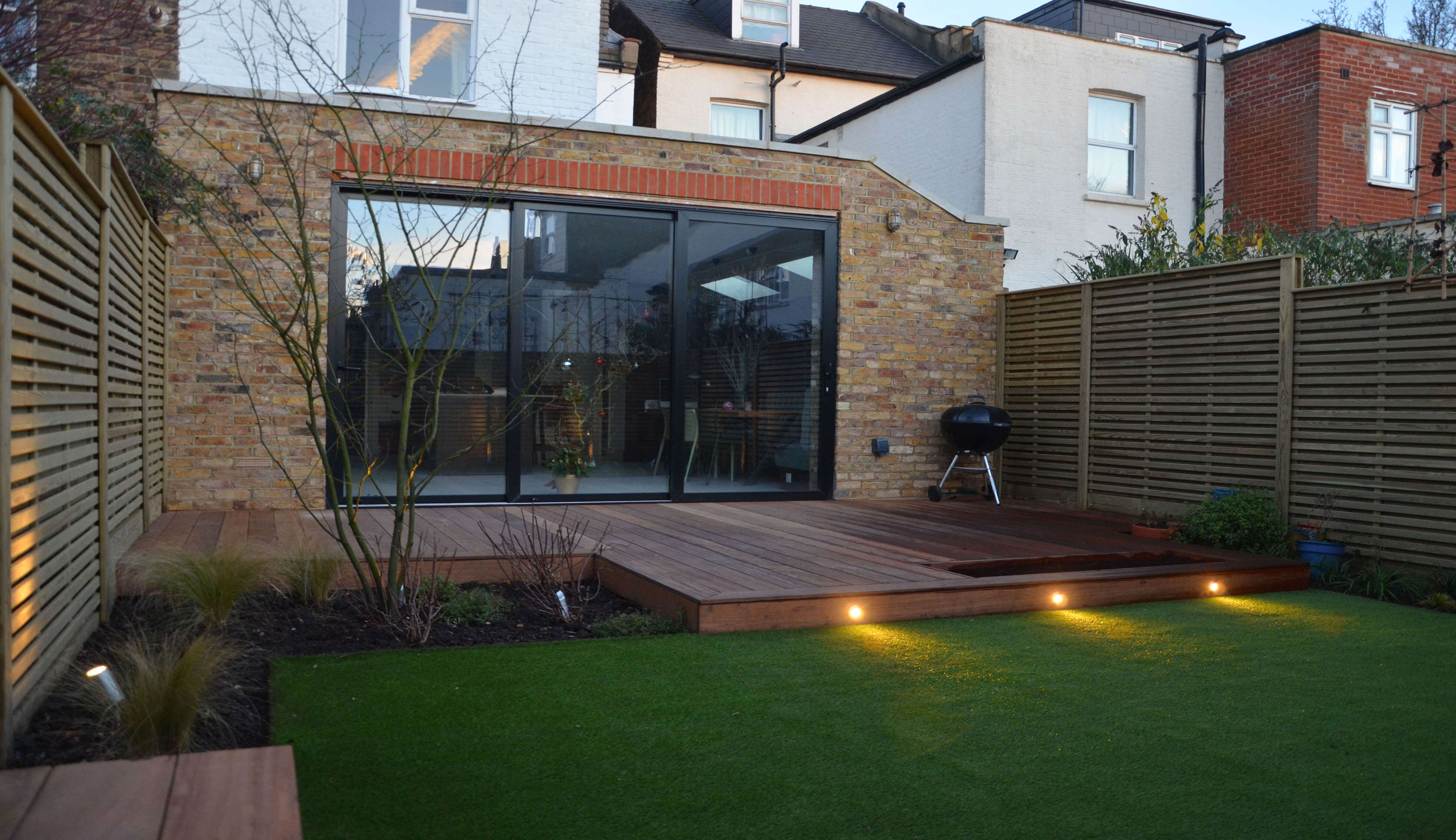 Fencing shot towards house and extension