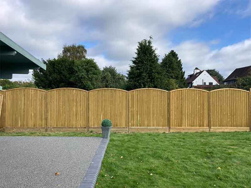 Arched fence panels create decorative boundary Jacksons Fencing