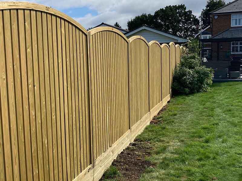 Curved top fence panels