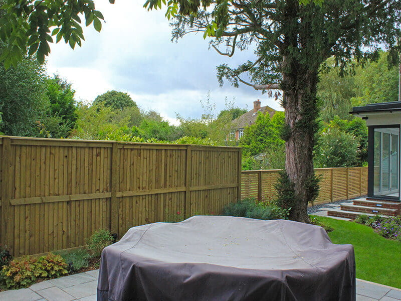 Featheboard and trellis in garden