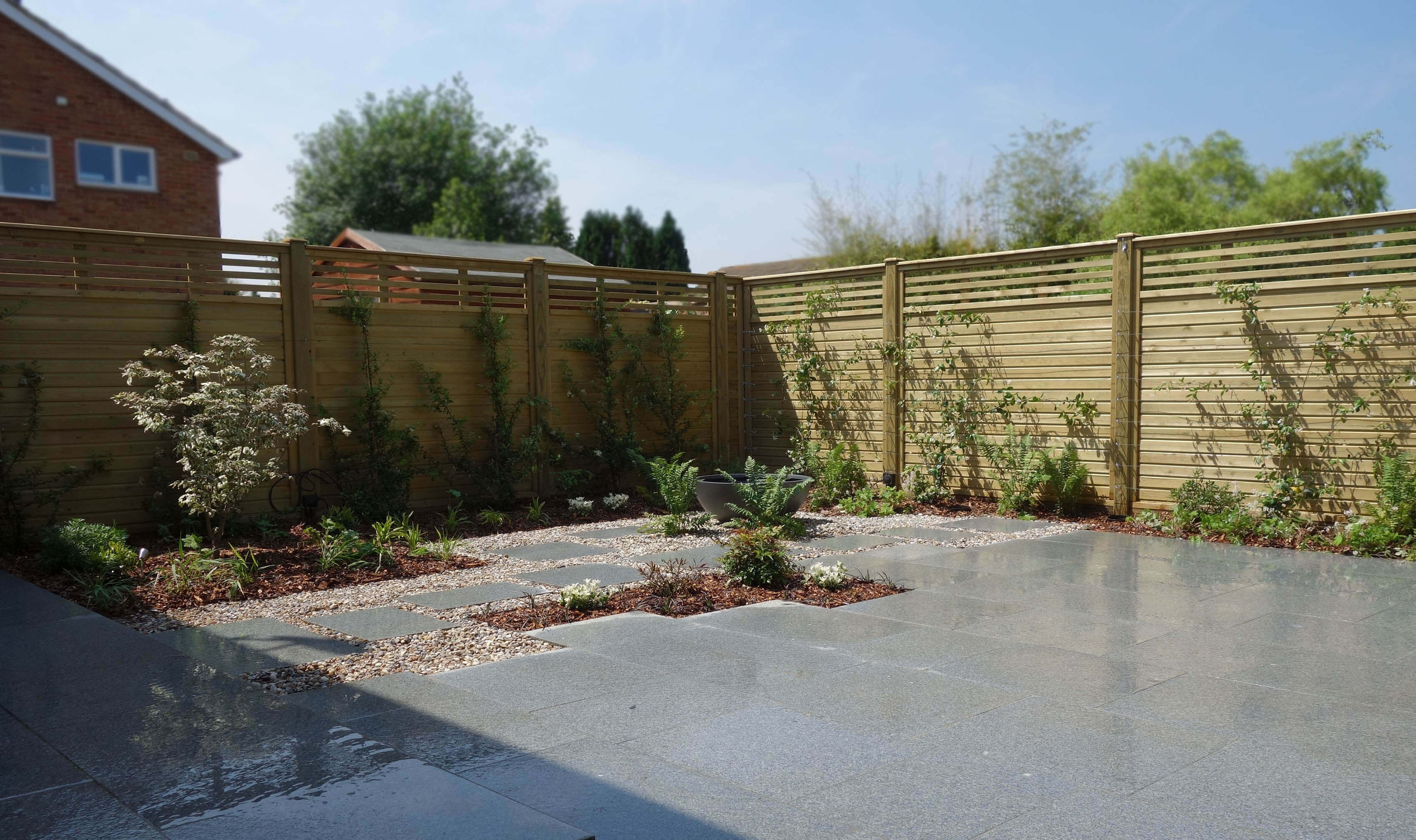 new wooden fence and garden design