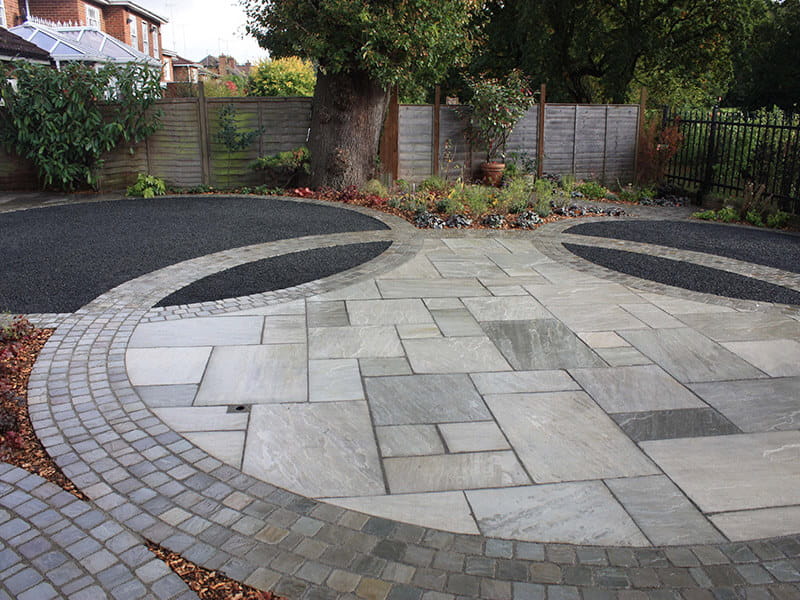 Circular paving design with Jacksons black railings