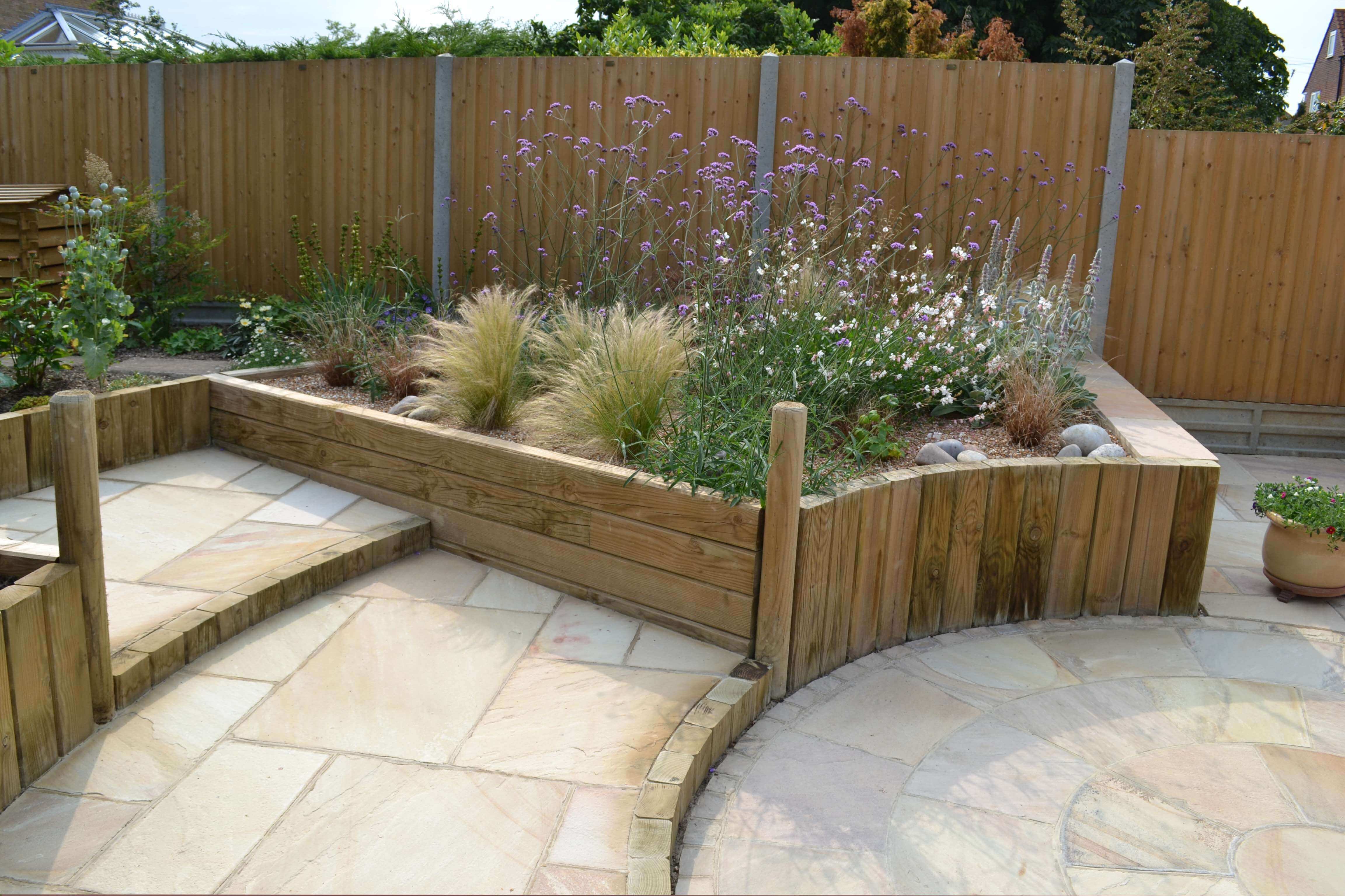paving with jakwall retaining timber wall