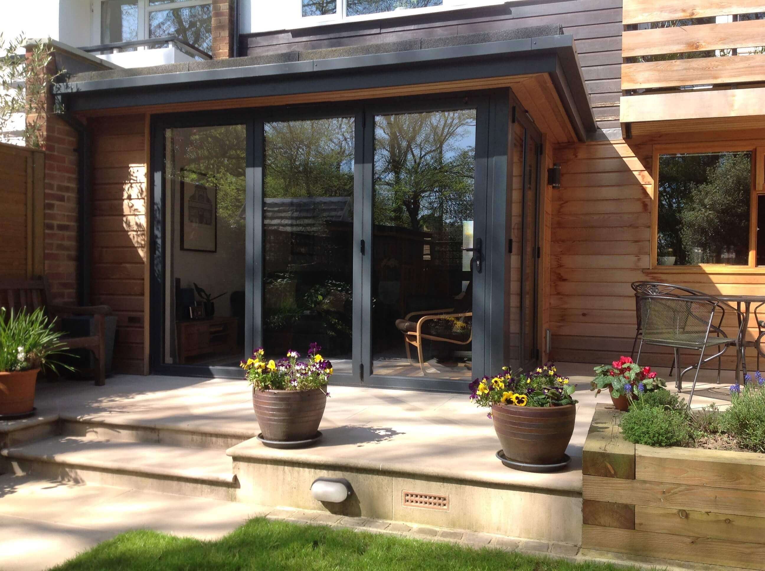 Patio area including raised bed