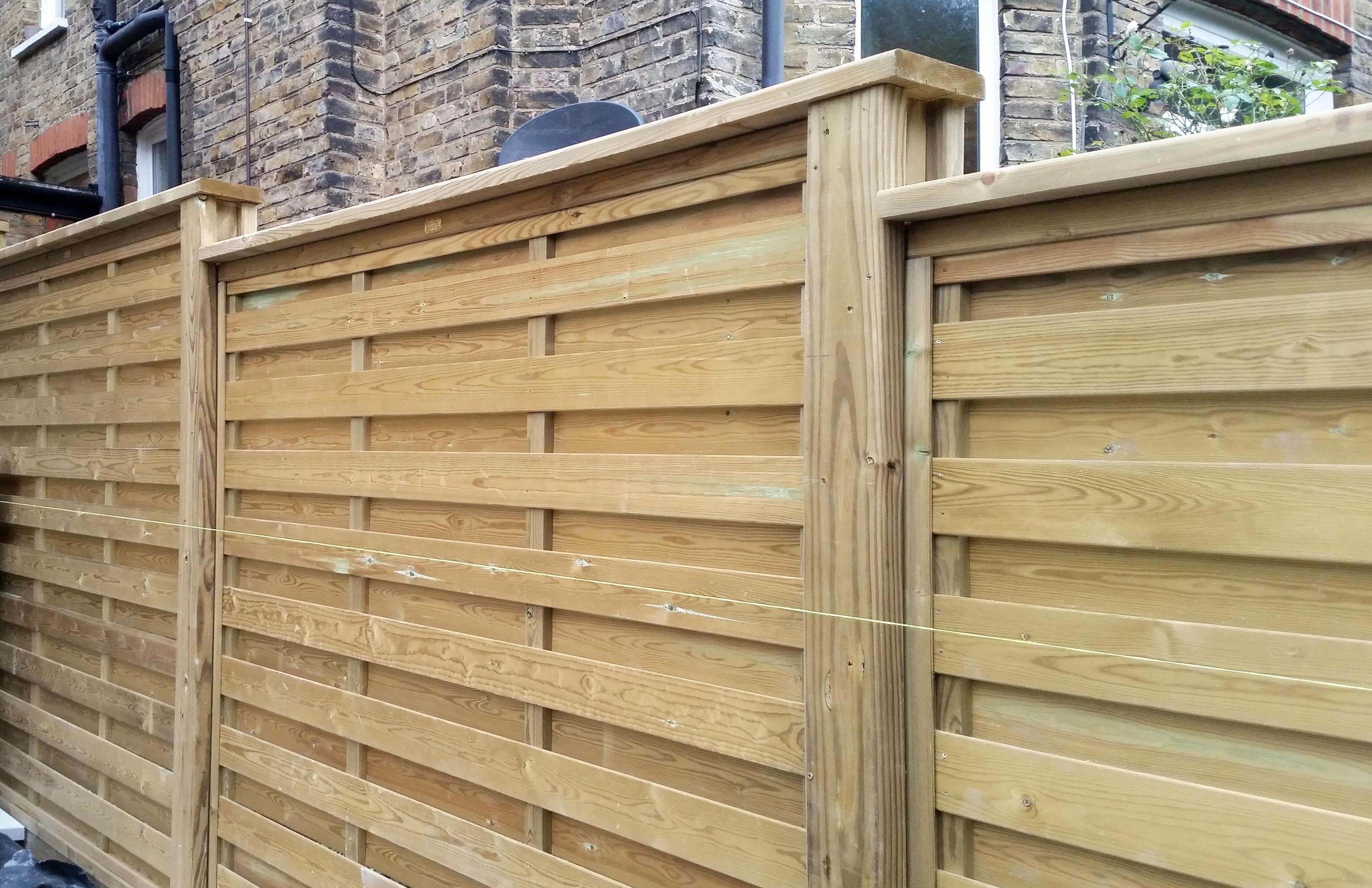 Newly installed Hit Miss horizontal slatted fence panels