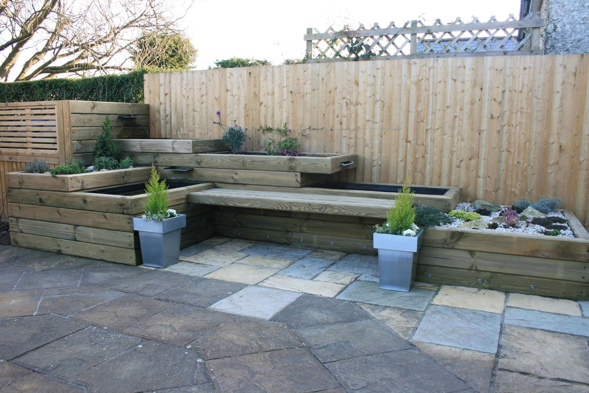 completed garden feature using landscape timbers