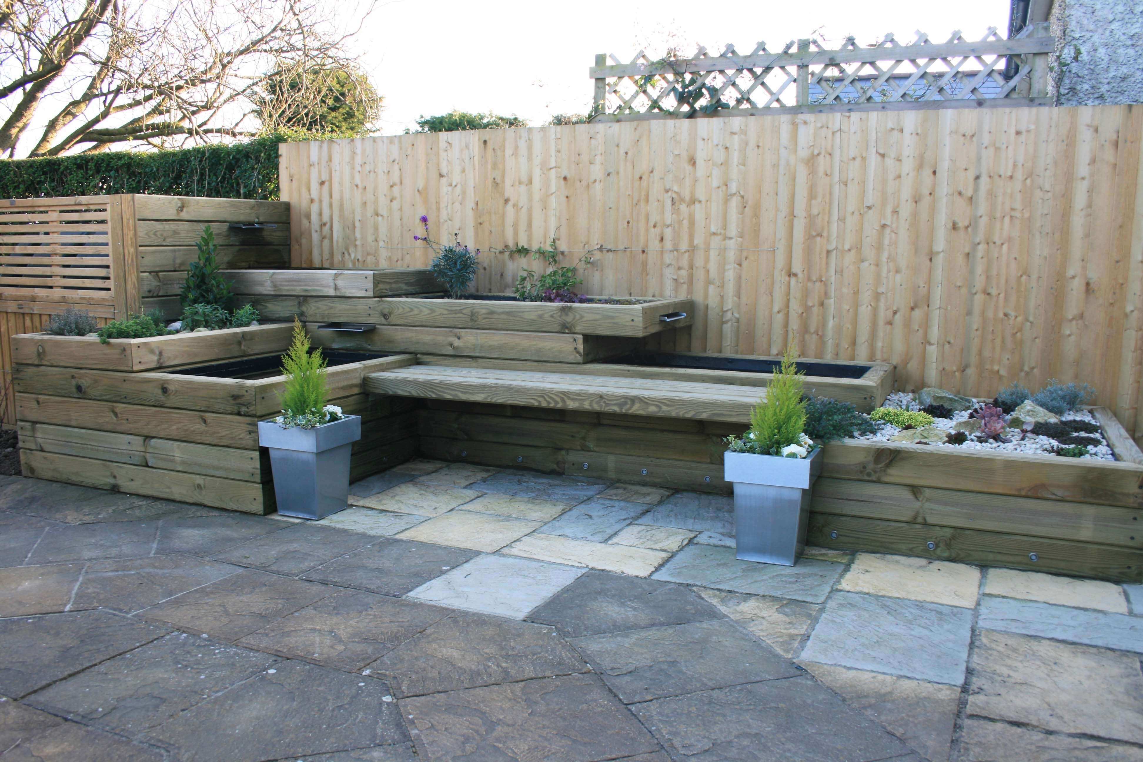 completed garden feature using landscape timbers
