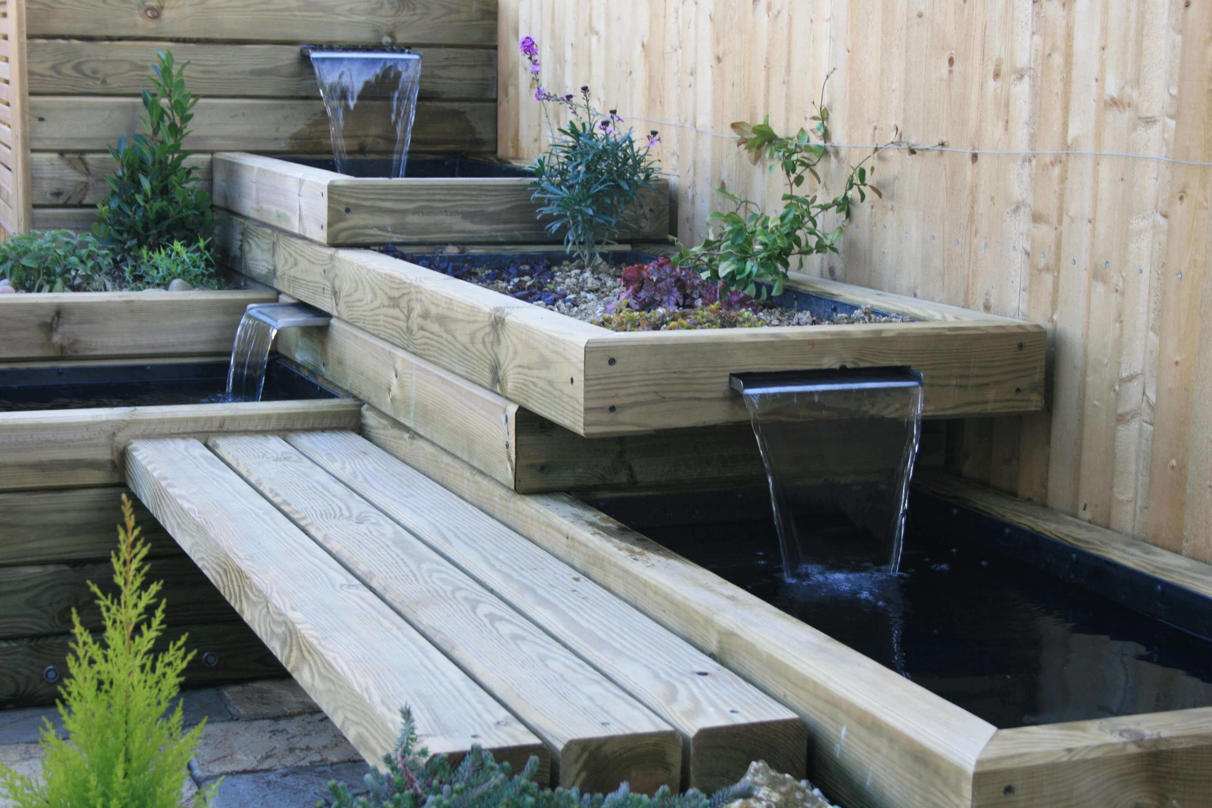 finished water feature using landscape timbers