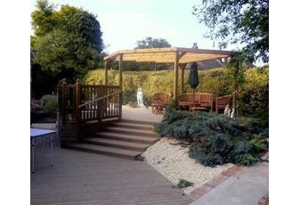 John Matthews Garden 'wonderland' created from Pergolas, Decking, Trellis and Balustrade