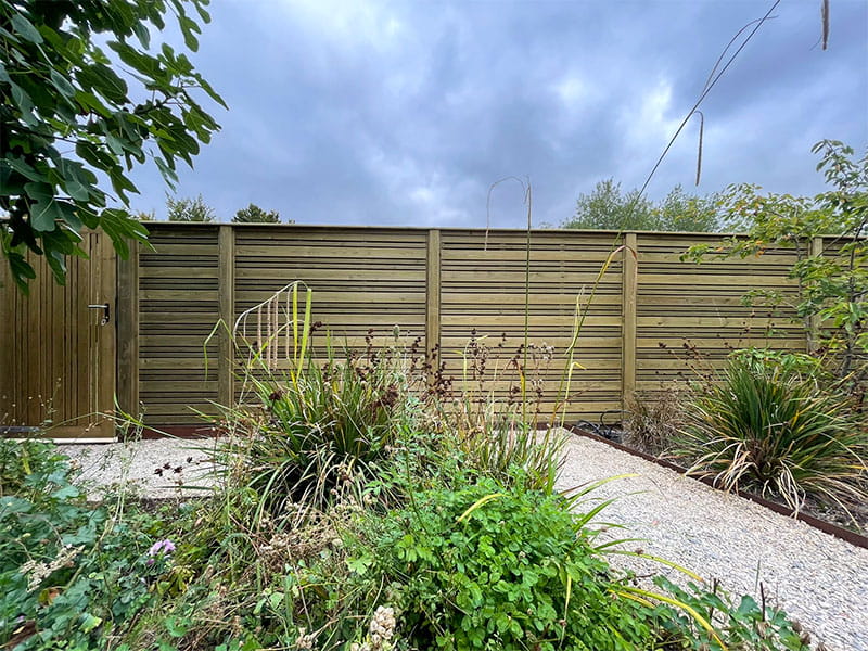 Modern slatted fence panels