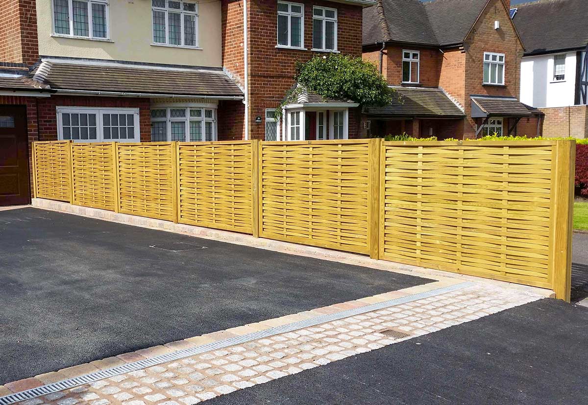 Driveway complete with woven fence panels