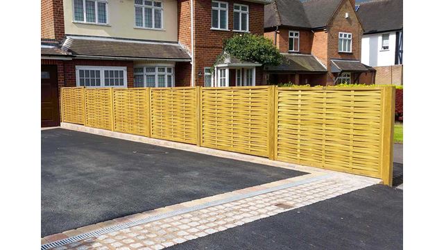 Driveway complete with woven fence panels