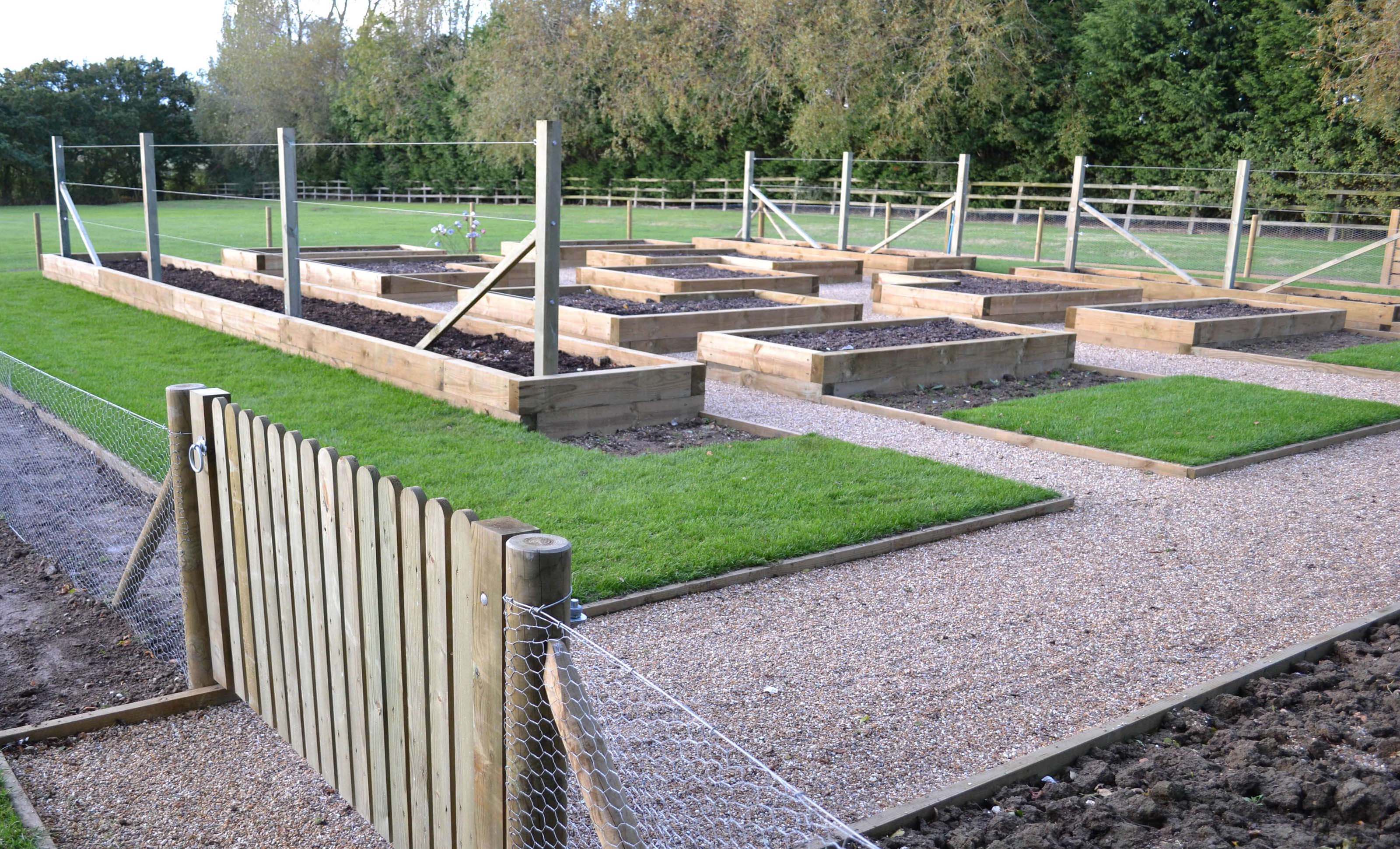 completed potager garden showing picket fence gate detail