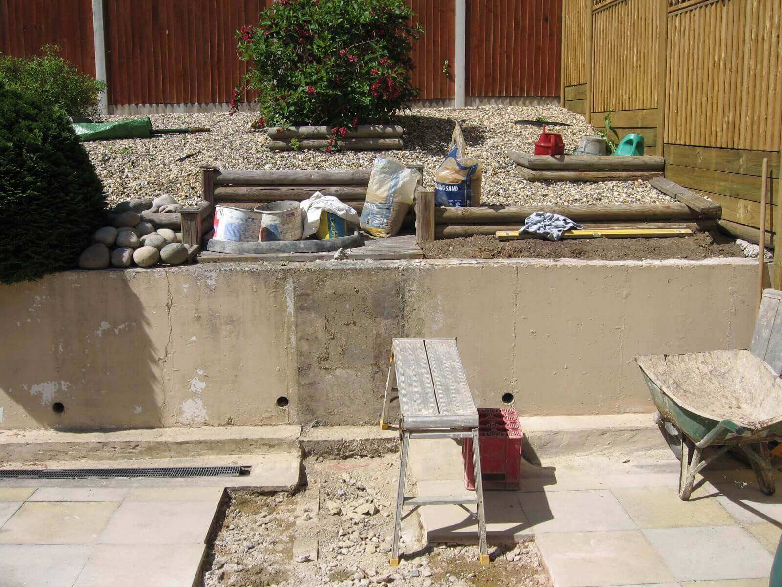 Concrete Retaining wall before Jakwall timber retaining wall