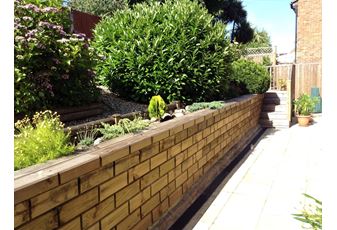 Retaining Wall Hidden By Jakwall Timber Sleepers