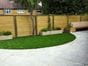 artificial grass play area with secure fence