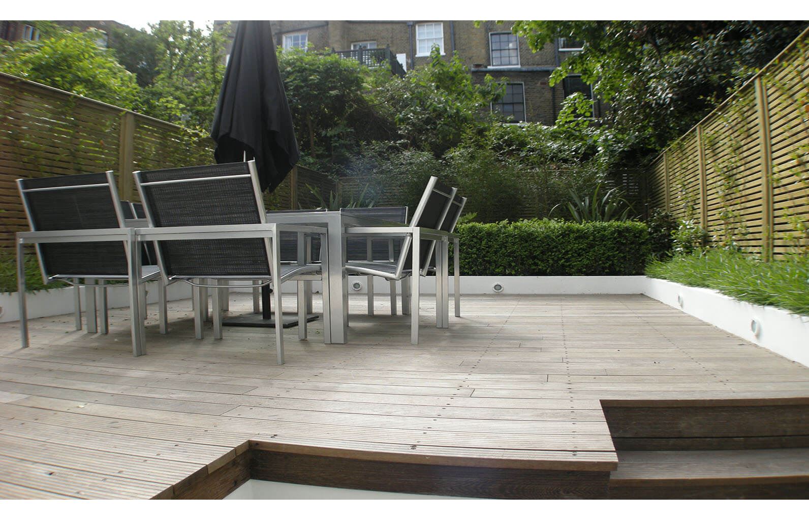 Venetian fence panels in London garden