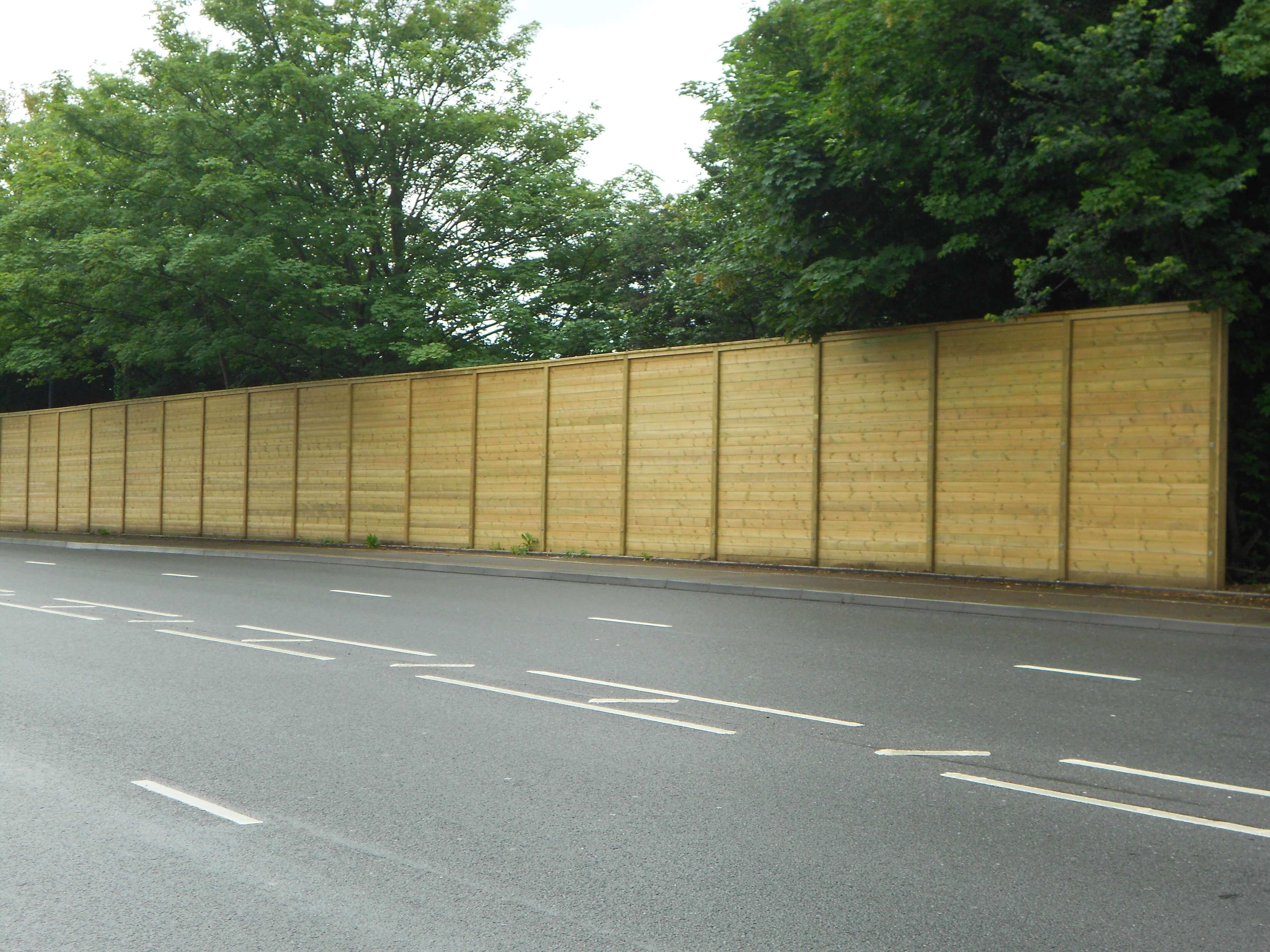 Acoustic fencing along road