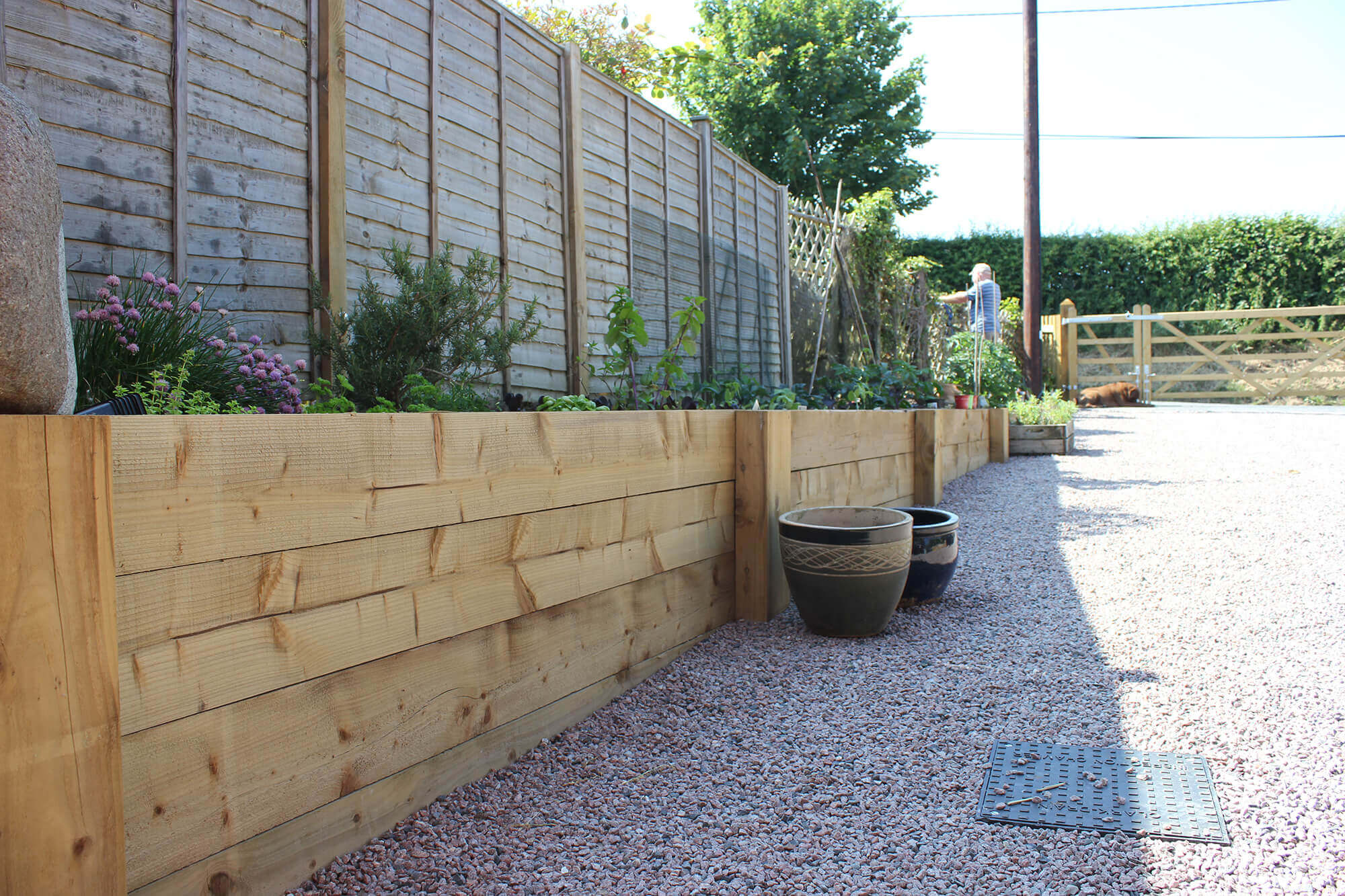 How To Build Raised Garden Bed Along Fence Garden Design Ideas