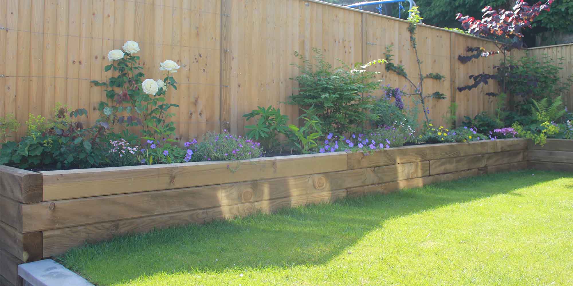 Raised Garden Bed With Sleepers, How To Make A Garden Border With Sleepers